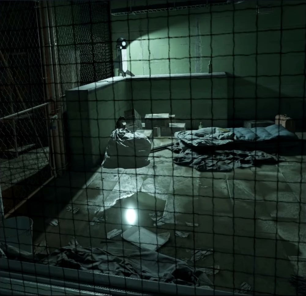 Blick durch eine Scheibe in einen düsteren Raum in Half-Life: Alyx